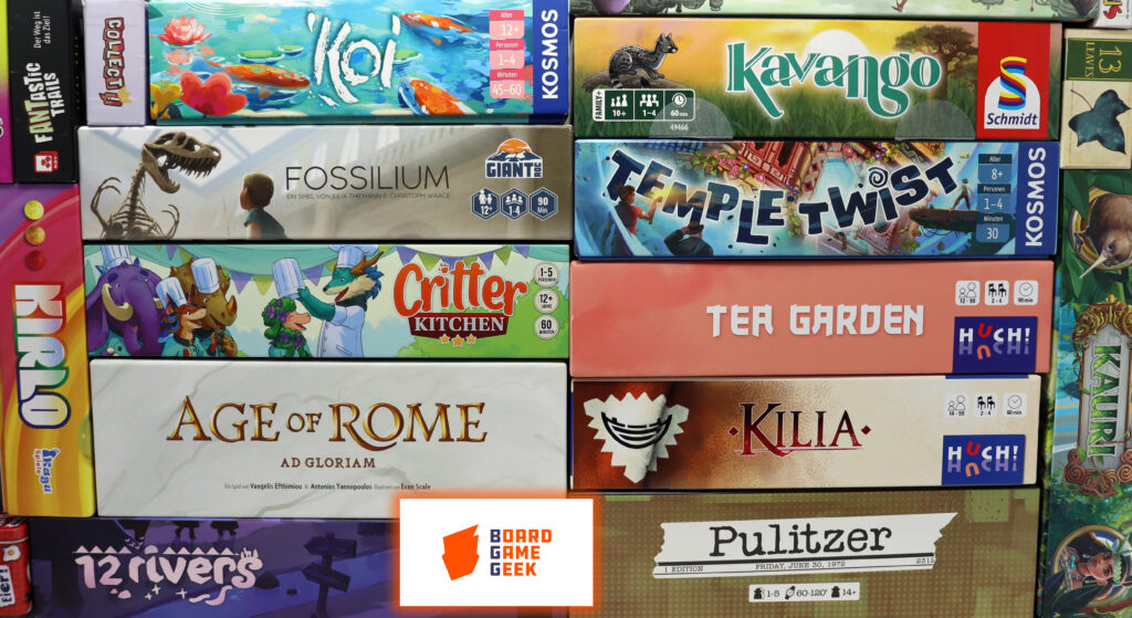 Viele verschiedene aufgestapelte Spiele.